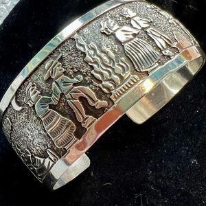Storytelling Cuff Bracelet by artist Floyd Becenti Navajo, sterling silver.